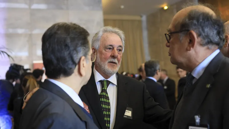 O presidente do Sebrae, Carlos Melles, e o ministro do STF, Gilmar Mendes.